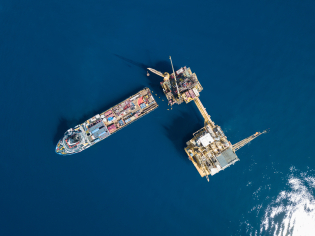 boat on offshore platform marine logistics